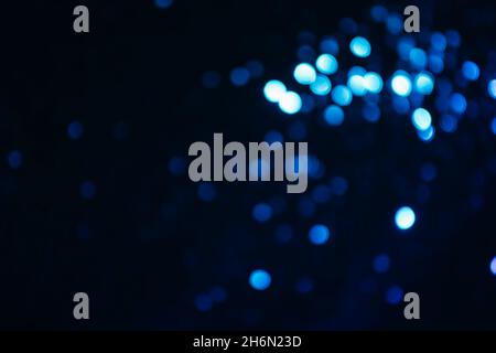 Sparkles multicolored shining on a dark background. Template for creative holiday design Stock Photo