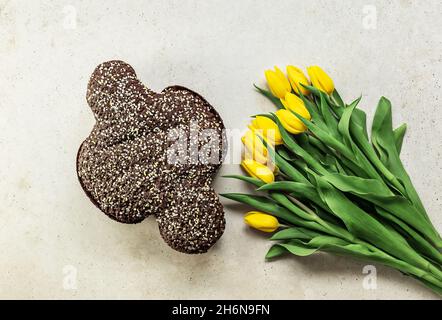 Traditional Italian Easter Cake with chocolate, Colomba di Pasqua or Easter Dove. Delicious sweet bread made with yeast. Stock Photo