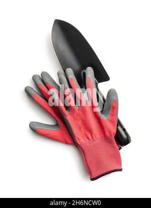 Garden shovel and working gloves isolated on white background. Stock Photo