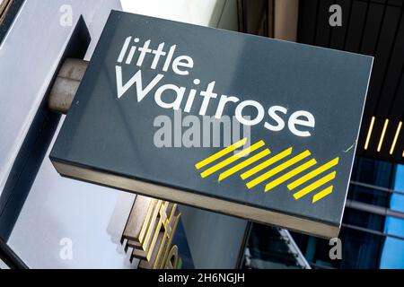 Victoria Westminster London England UK, November 7 2021, Little Waitrose Supermarket Sign Outside Shop In Victoria Street London Looking Up With No Pe Stock Photo