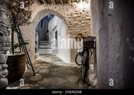 A night time scene on the back streets of a Ano Syros at dusk. Stock Photo