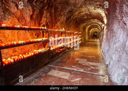 Covadonga sanctuary and cave with candles. Asturias landmark. Spain Stock Photo