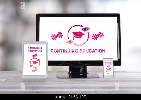 Continuing education concept shown on different information technology devices Stock Photo