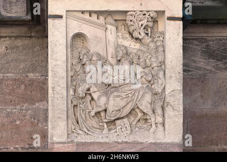 Relief with Jesus on the Donkey, the Entry into Jerusalem at the Gothic Church of St. Sebald, Nuremberg, Middle Franconia, Bavaria, Germany Stock Photo