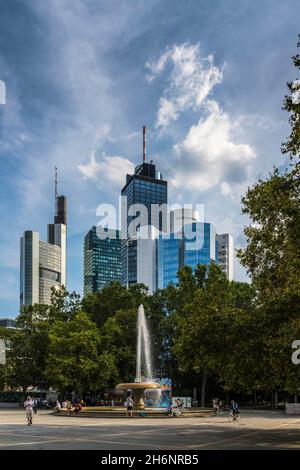 Lucae Fountain on Opernplatz in front of the skyline of Frankfurt am Main with the high-rise buildings Buerohaus an der Alten Oper, Commerzbank Stock Photo