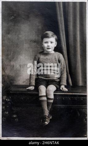 1930s 1940s PORTRAIT BOY SITTING FENCE HOLDING HIS COLLIE DOG PET Stock ...