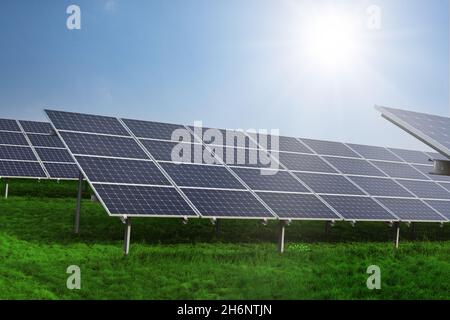 Solar panel on blue sky background. Solar panel on dramatic sunset sky background, Alternative energy concept, copy-space. Stock Photo