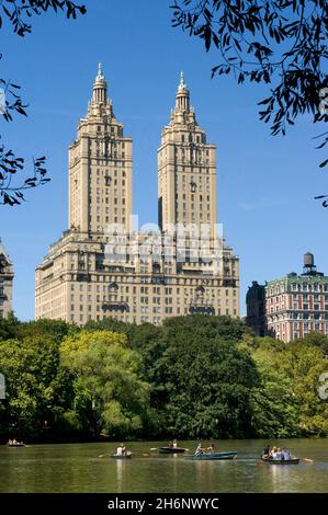 New York City in Summer on the Lake with Central Park West Skyline and the Dakota Apartments, New York, USA