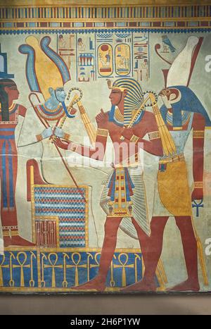 Ancient Egyptian painted wall relief from the tomb of Sety I, 1290-1279 BC, 19th dynasty, Valley of the Kings Kuxor. Plaster cast.  The panel depicts Stock Photo