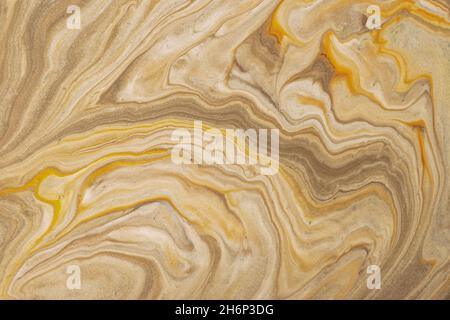 Abstract fluid art background light brown and golden colors. Liquid marble. Acrylic painting on canvas with beige gradient. Watercolor backdrop with w Stock Photo