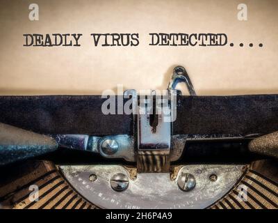 Deadly virus detected displayed on a classic typewriter Stock Photo