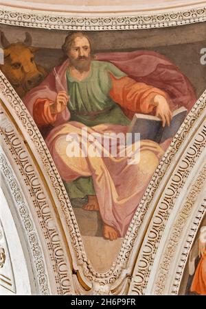 ROME, ITALY - AUGUST 29, 2021: The fresco of St. Luke the Evangelist in the church Chiesa di San Francesco a Ripa by Giovani Battista Ricci Stock Photo