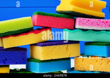 Pile of new multicolored cleaning sponges, close up Stock Photo