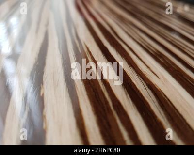 Striped brown and sand wooden lacquered background. Stock Photo