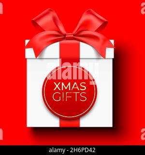 Christmas gifts vector card design, with a white gift box wrapped with satin ribbon, and lettering label, lying on red background with copy space. Stock Vector