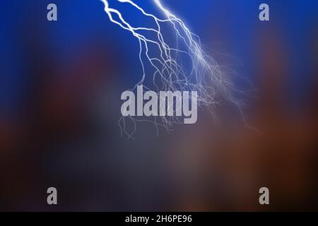 Big lightning and thunder on the sky. Dramatic nature force background Stock Photo