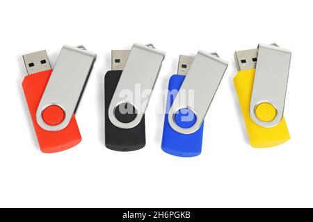 Four Colorful USB Pen Drives on White Background Stock Photo