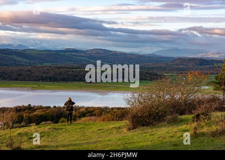 Sunset over the Cumbrian fells from Arnside Knott, Arnside, Cumbria, UK. Stock Photo