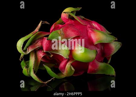 Dragon fruit horizontally rotated on a black background Stock Photo