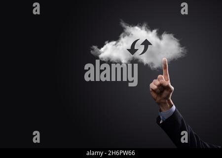 Cloud technology. Polygonal wireframe cloud storage sign with two arrows up and down on dark . Cloud computing, big data center, future infrastructure Stock Photo