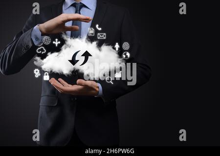 Cloud technology. cloud storage sign with two arrows up and down on dark . Cloud computing, big data center, future infrastructure, digital ai concept Stock Photo