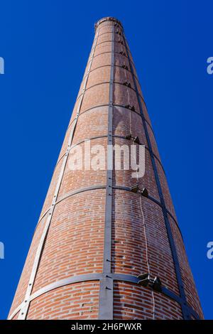 Castelo Branco, Portugal - November 09 2021: Tall brick chimney in Castelo Branco Portugal Stock Photo