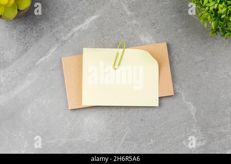 Open notepad on gray marble background Stock Photo