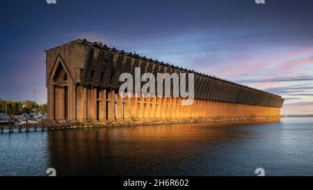 Lower Harbor Ore Dock at sunset on Lake Superior in downtown Marquette, Michigan Stock Photo