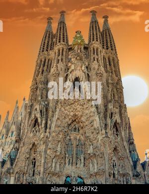 Facade of unfinished sacred family 'La Sagrada Familia' , cathedral designed by Gaudi, being built since 19 March 1882 with people donations. The text Stock Photo