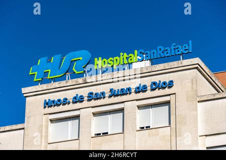 Madrid, Spain - September 12, 2021: San Rafael Hospital in Madrid. Brothers Hospitallers of Saint John of God. Sign on top of the building. Stock Photo