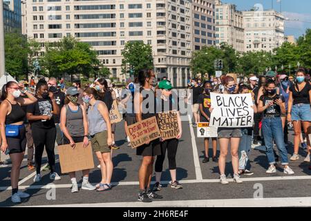Washington D.C. , USA. 4th Jul 2020. Protesters pause while marching during President Donald Trump's 'Salute To America' Fourth of July celebration. Credit: Rise Images/Alamy Stock Photo