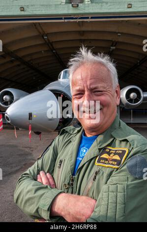 Dave Piper, pilot of Canberra PR9 jet plane of Midair Squadron, de-mobbed RAF Royal Air Force jet airplane at Kemble, Cotswold Airport, UK Stock Photo
