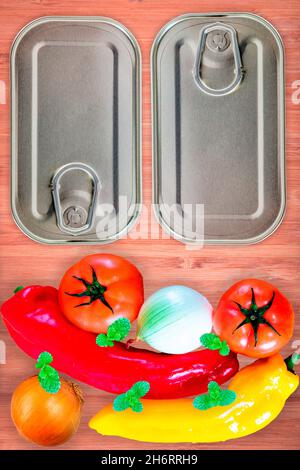 Top view of vegetables, cans with preserves on a wooden surface Stock Photo