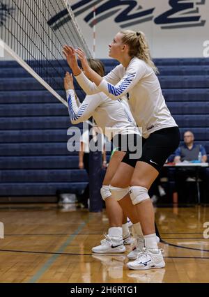 Volleyball action with Snake River vs Sugar Salem High School in Coeur d'Alene, Idaho. Stock Photo