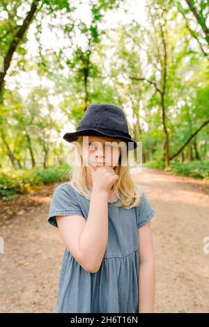 Funny portrait of a young girl making a silly face Stock Photo