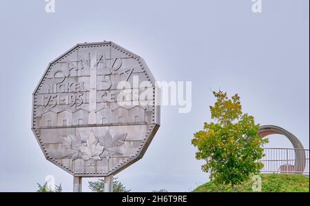 The worlds largest coin, the Big Nickel is a replica of a 1951 Canadian nickel located in Sudbury Ontario Canada a world leader in nickel mining. Stock Photo