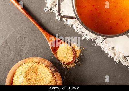 Tarhana soup is a traditional Turkish dish made by adding the powdered fermented mixture of tomatoes, peppers, yoghurt and flour into water. A healthy Stock Photo