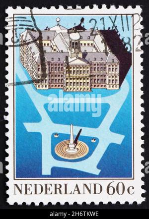 NETHERLANDS - CIRCA 1983: a stamp printed in the Netherlands shows Royal Palace, Dam Square, Amsterdam, circa 1983 Stock Photo