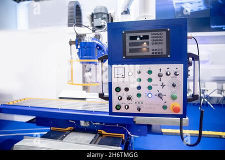 Modern control panel CNC metalworking machine. Industry automation factory mill drill technology work. Stock Photo