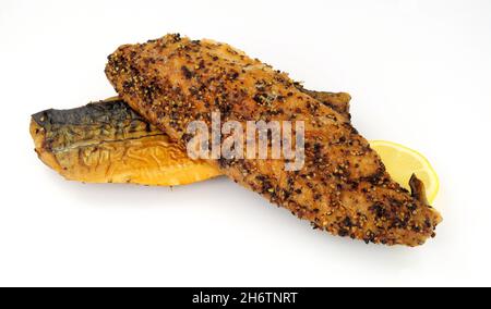 Two cooked smoked peppered mackerel fish fillets Stock Photo