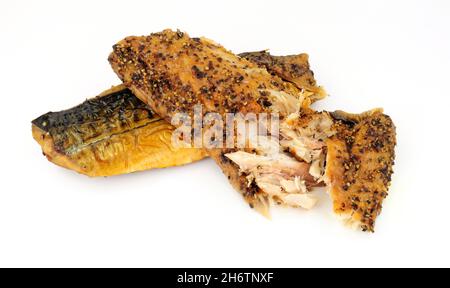Two cooked smoked peppered mackerel fish fillets Stock Photo