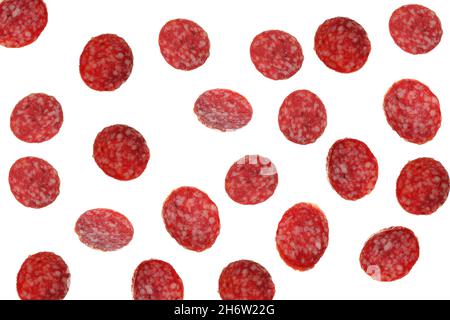 Falling salami sausage isolated on white background Stock Photo