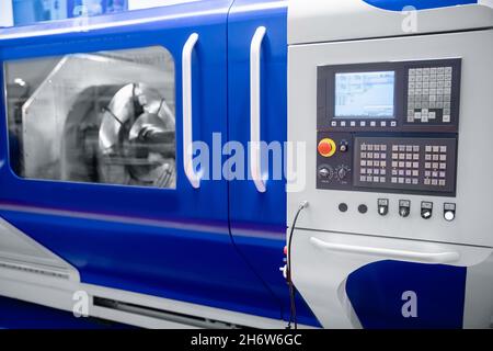 Modern control panel CNC metalworking machine. Industry automation factory mill drill technology work. Stock Photo