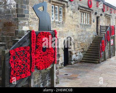 Poppy display marking the 100th anniversary of the Royal British Legion in 2021 at the Castle in  Knaresborough Yorkshire England Stock Photo