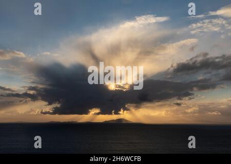 sunset over north and south uist islands western scotland Stock Photo