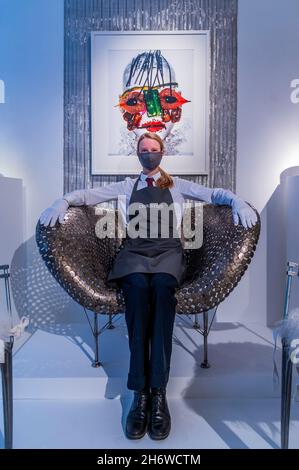 London, UK. 18th Nov, 2021. Johnny Swing's Half Dollar Chair (estimate: £20,000-30,000) - The Collection of Victoria, Lady de Rothschild in an online sale at Christies that opens for bidding on 18 November and closes on 9 December. Credit: Guy Bell/Alamy Live News Stock Photo