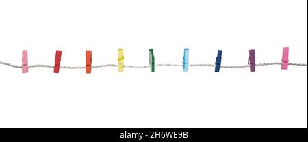 Multicolored wooden clothespins on a rope isolated on white background Stock Photo