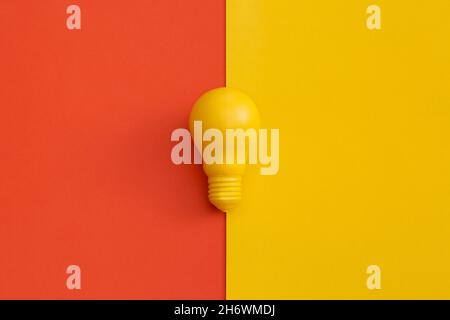 Light bulb on color background. Inspiration and creative idea concept. Top view with copy space. Flat lay composition. Stock Photo
