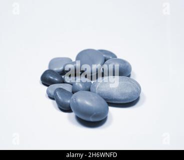 cyanotypes sea stone collection on white floor. Stock Photo
