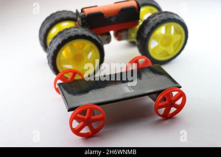Small scale solar car working model with an electric car that shows the concept of future energy of transportation Stock Photo